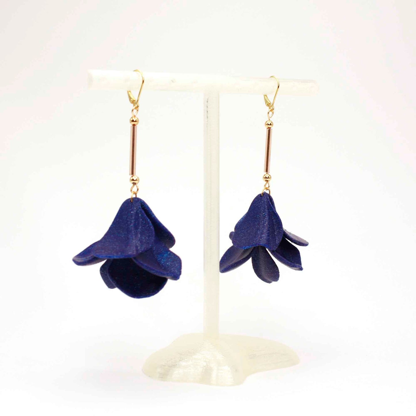 Malvace earrings in Ultramarine Blue. 3D printed in PLA with a glitter effect.