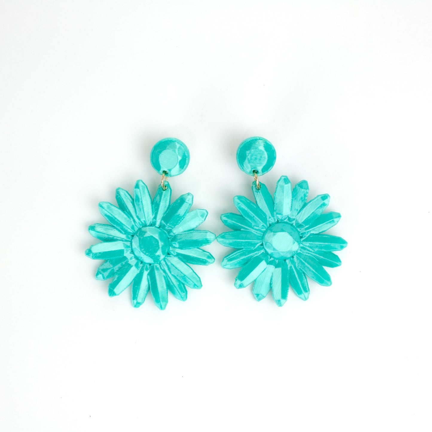 Sevilha earrings, in a silky turquoise color like the sea.