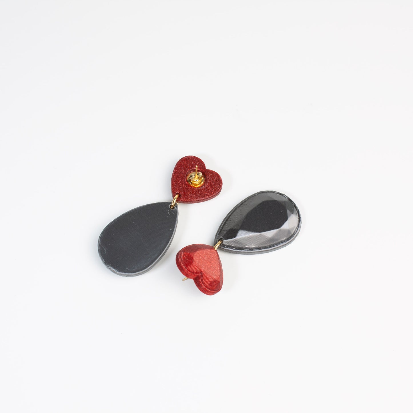 Jewel Heart earrings in red and graphite, 3D printed. Inner Love collection. Show off!
