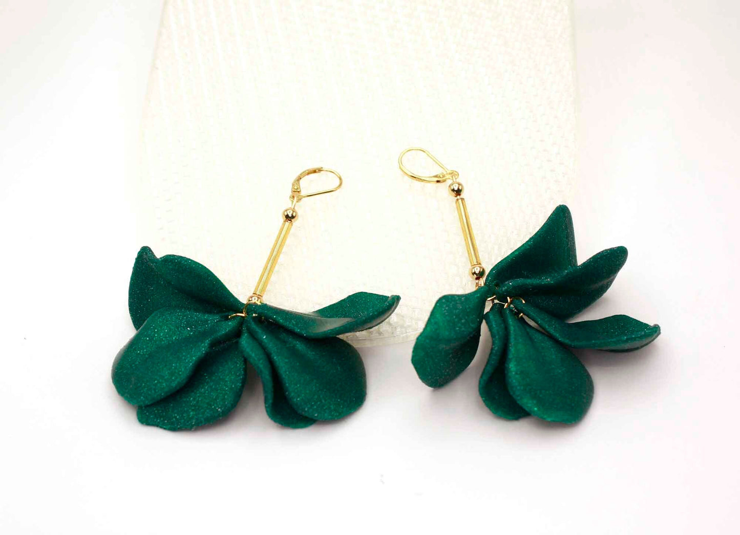 Emerald-colored Malvace earrings. 3D printed in glitter-effect PLA.