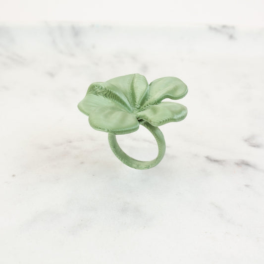 Custom-made 3D printed Hibis flower ring in Leaf Green, available in various colors.