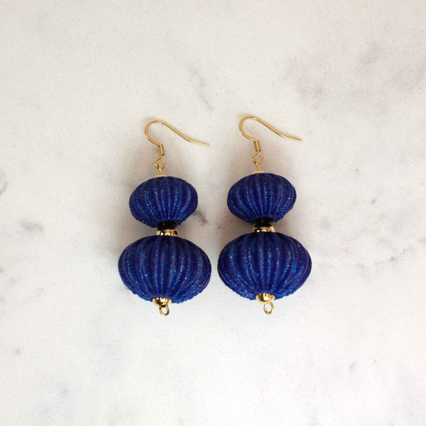 Boletia earrings from the Lukt collection, in Ultramarine Blue, 3D printed, elegant and lightweight.