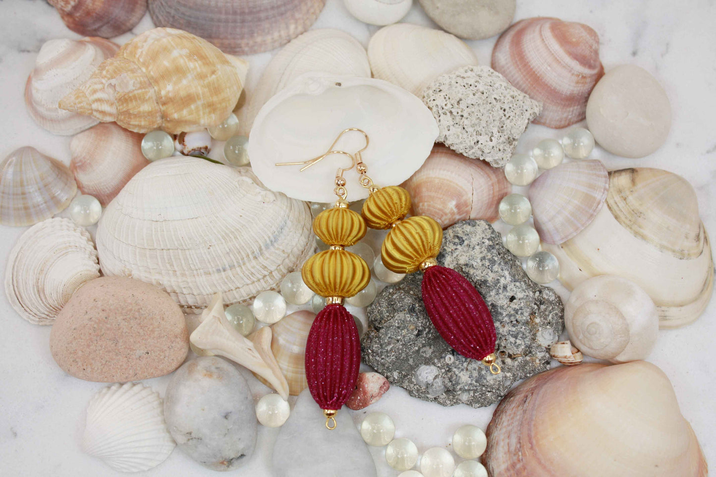 Anemone earrings from the Lukt collection, in Magenta and Gold, 3D printed, very light and sophisticated.