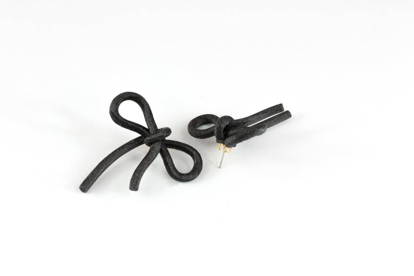 Black bow earrings with snap closure. Coquette Collection.