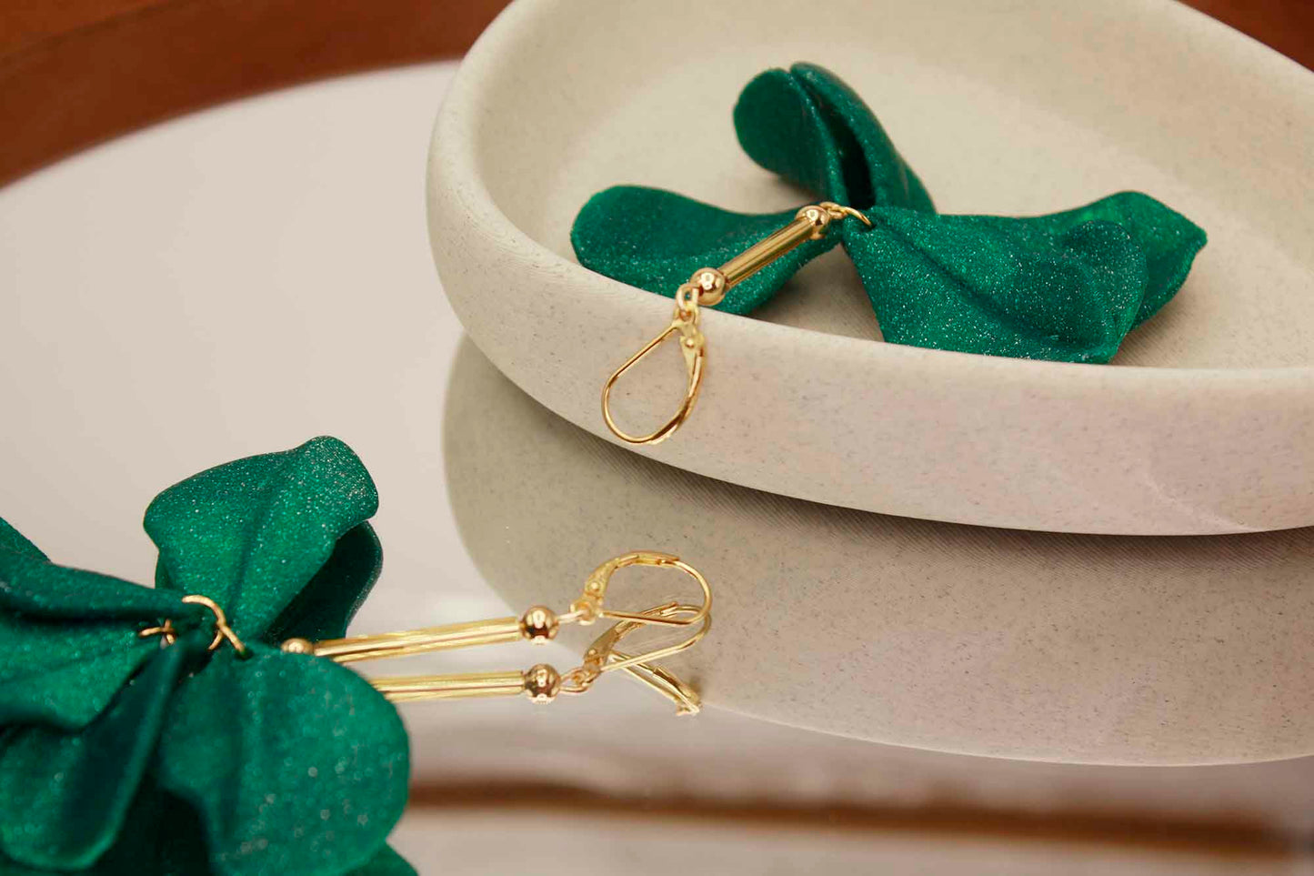 Emerald-colored Malvace earrings. 3D printed in glitter-effect PLA.