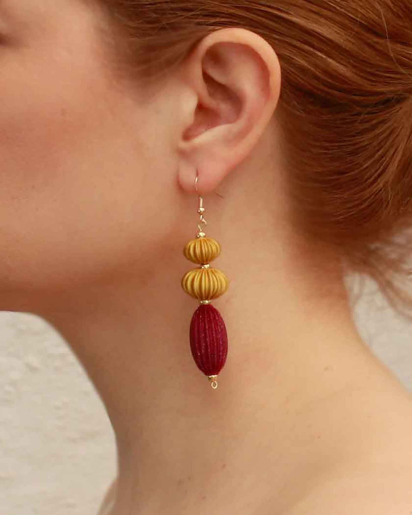 Anemone earrings from the Lukt collection, in Magenta and Gold, 3D printed, very light and sophisticated.