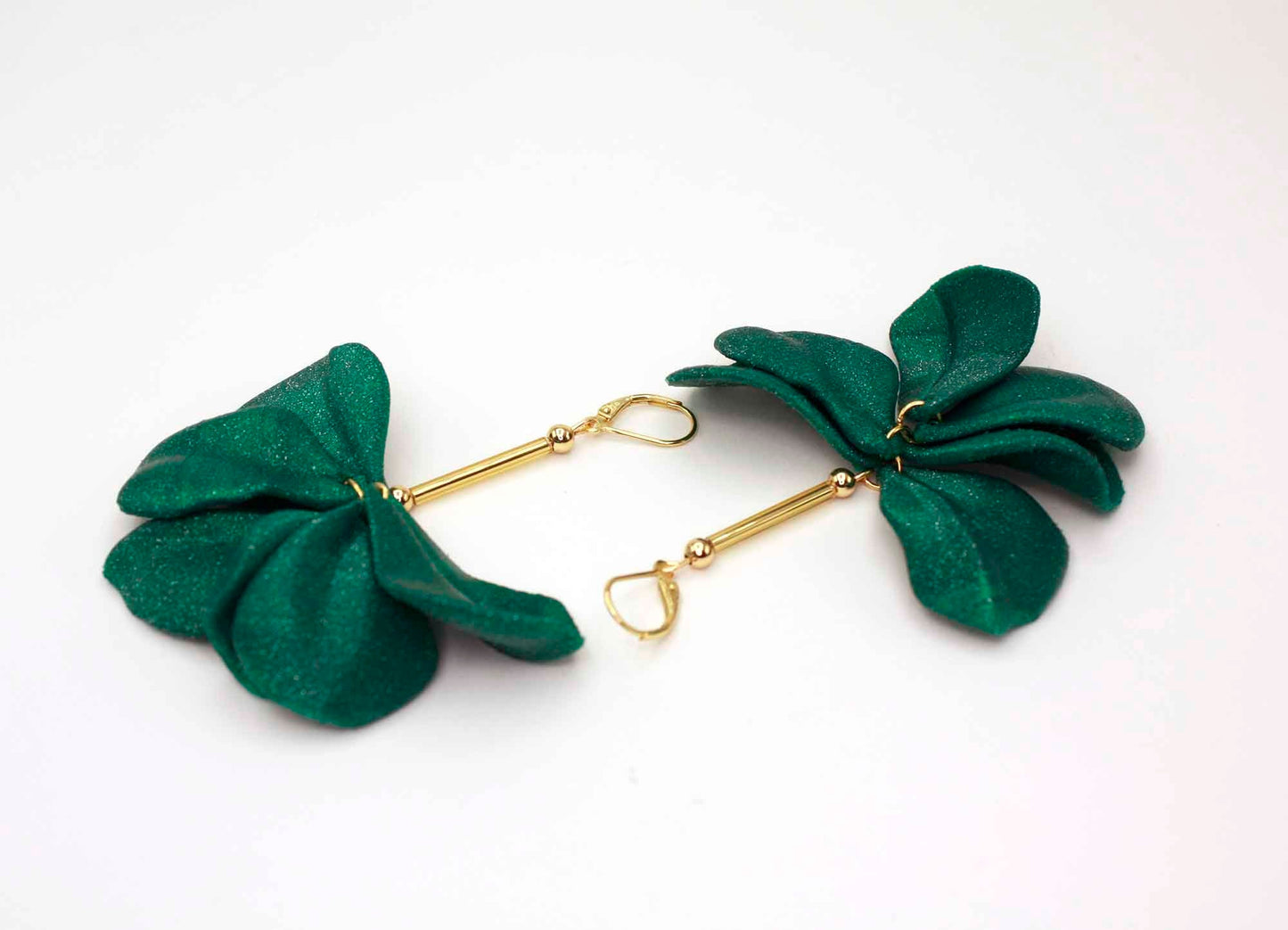 Emerald-colored Malvace earrings. 3D printed in glitter-effect PLA.