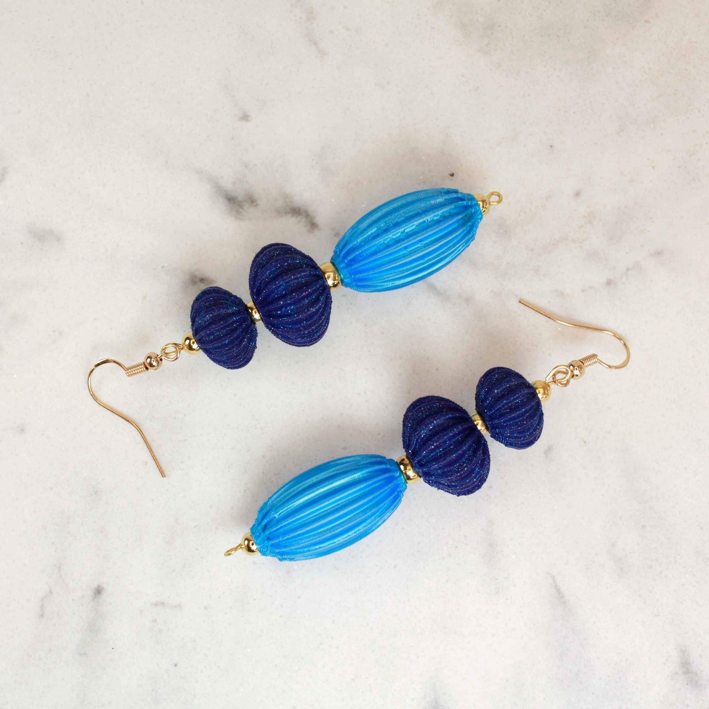 Anemone earrings from the Lukt collection, in Ultramarine Blue and Cyan, 3D printed, very light and elegant.