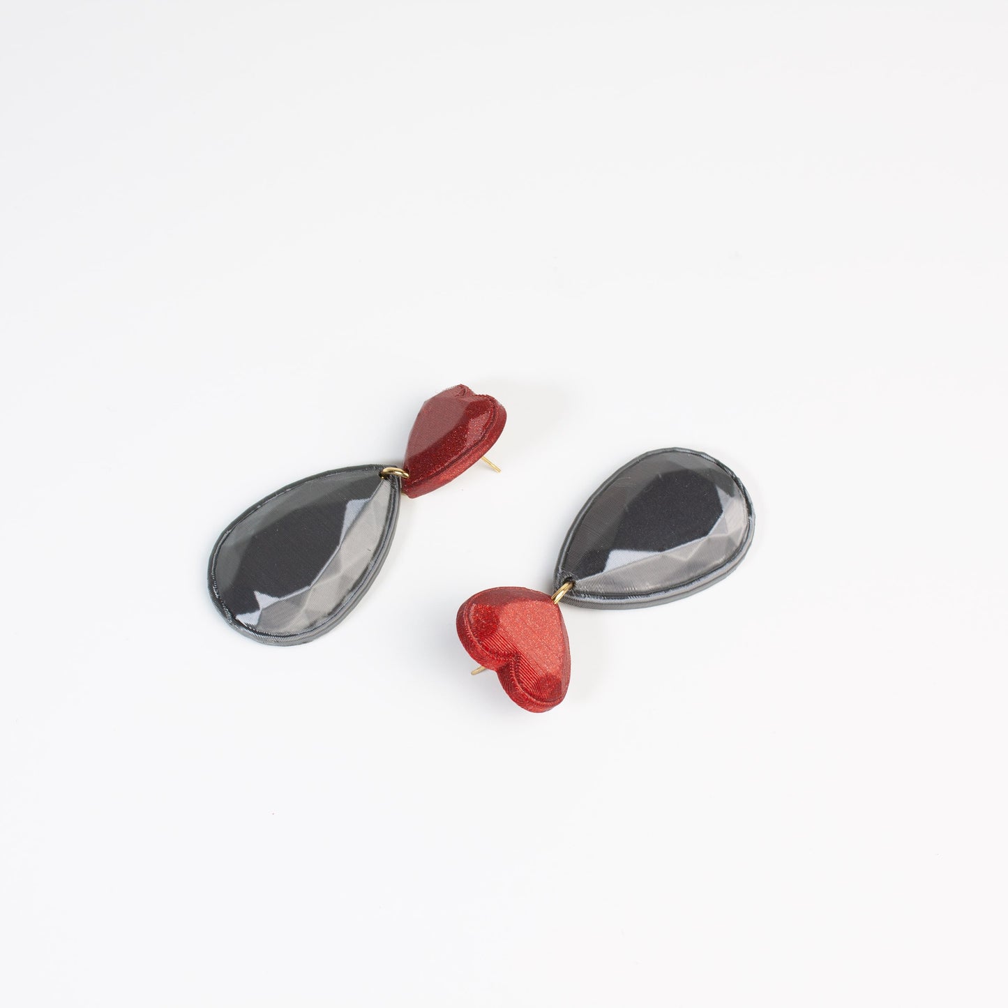 Jewel Heart earrings in red and graphite, 3D printed. Inner Love collection. Show off!