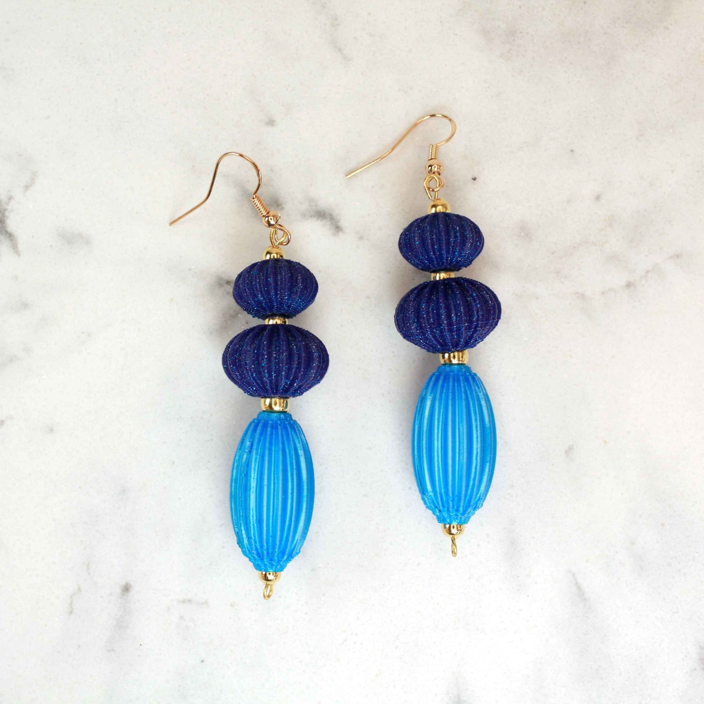 Anemone earrings from the Lukt collection, in Ultramarine Blue and Cyan, 3D printed, very light and elegant.