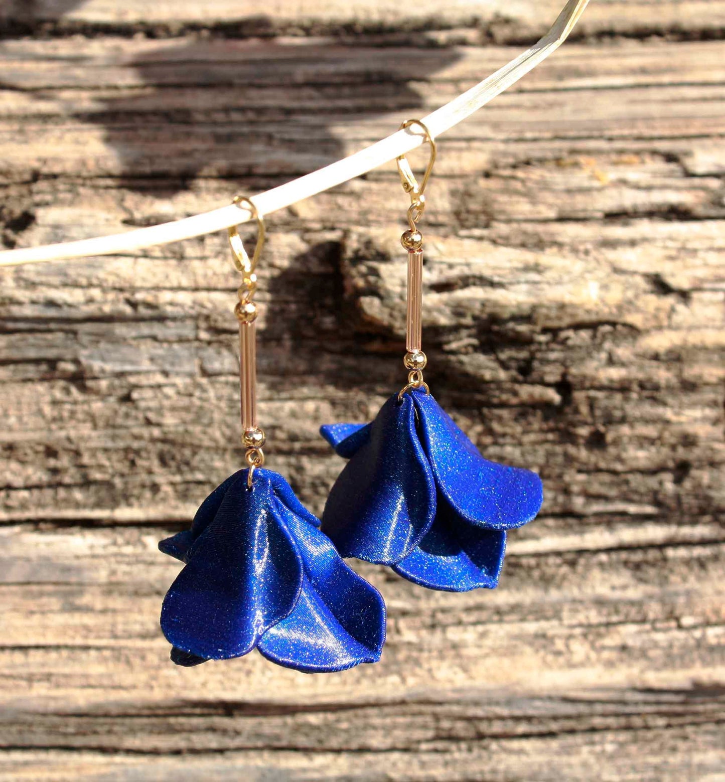Malvace earrings in Ultramarine Blue. 3D printed in PLA with a glitter effect.