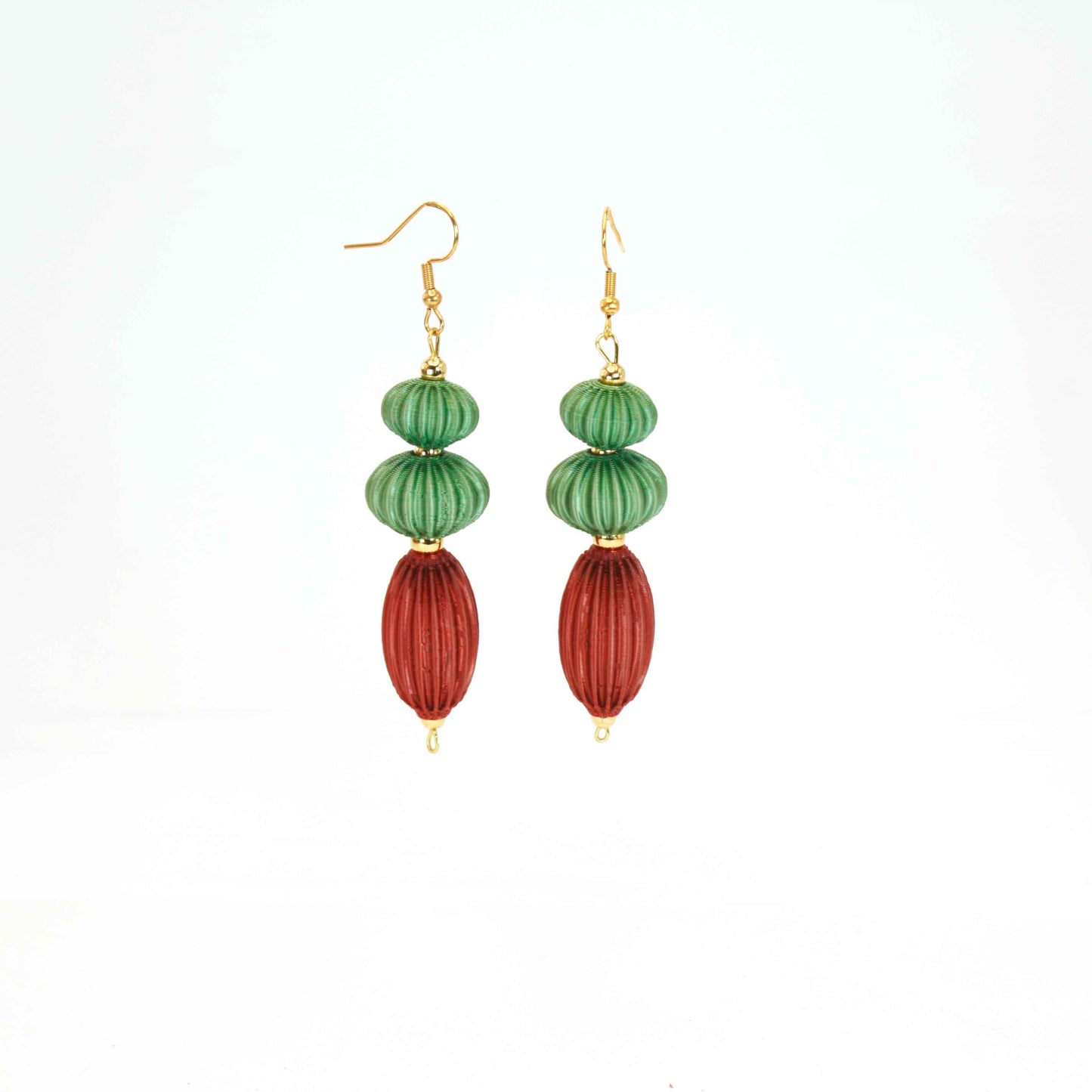 Anemone earrings from the Lukt collection, in Leaf and Cooper Green, 3D printed, very light and sophisticated.