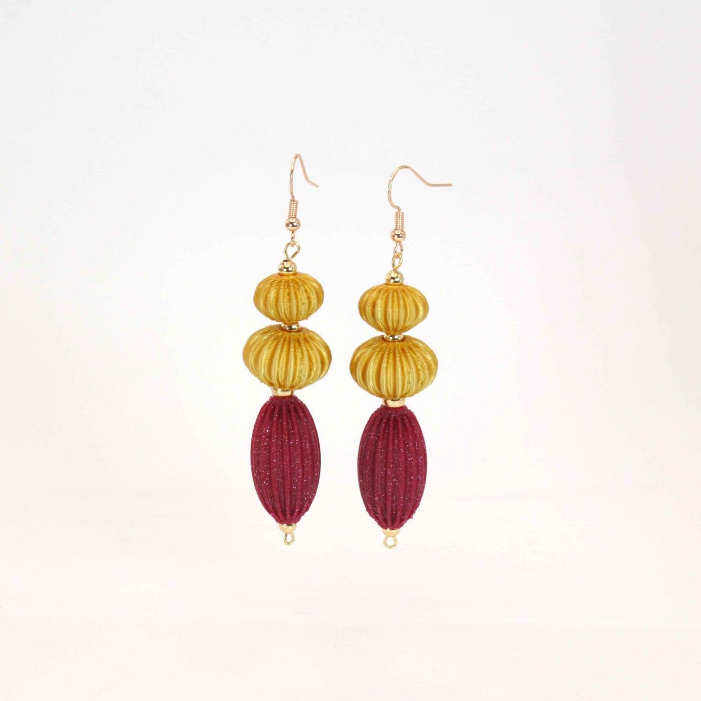 Anemone earrings from the Lukt collection, in Magenta and Gold, 3D printed, very light and sophisticated.