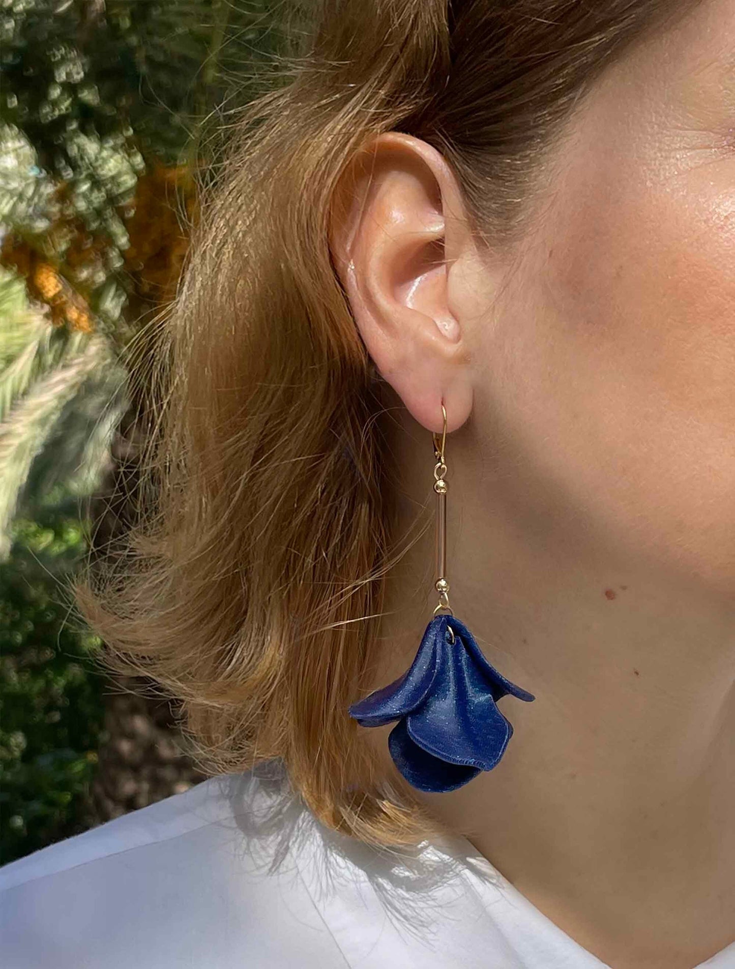 Malvace earrings in Ultramarine Blue. 3D printed in PLA with a glitter effect.