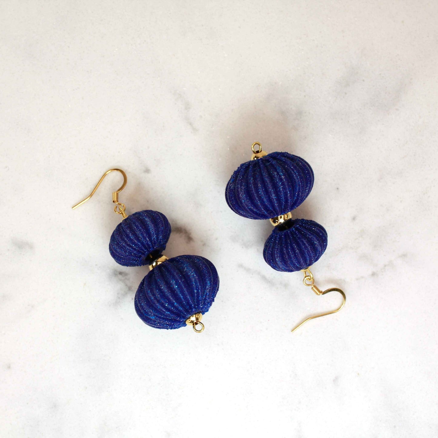 Boletia earrings from the Lukt collection, in Ultramarine Blue, 3D printed, elegant and lightweight.
