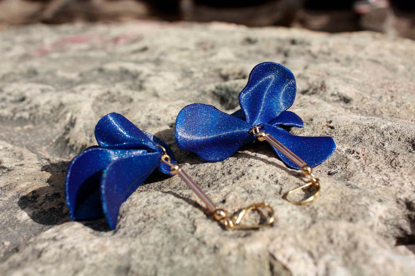 Malvace earrings in Ultramarine Blue. 3D printed in PLA with a glitter effect.