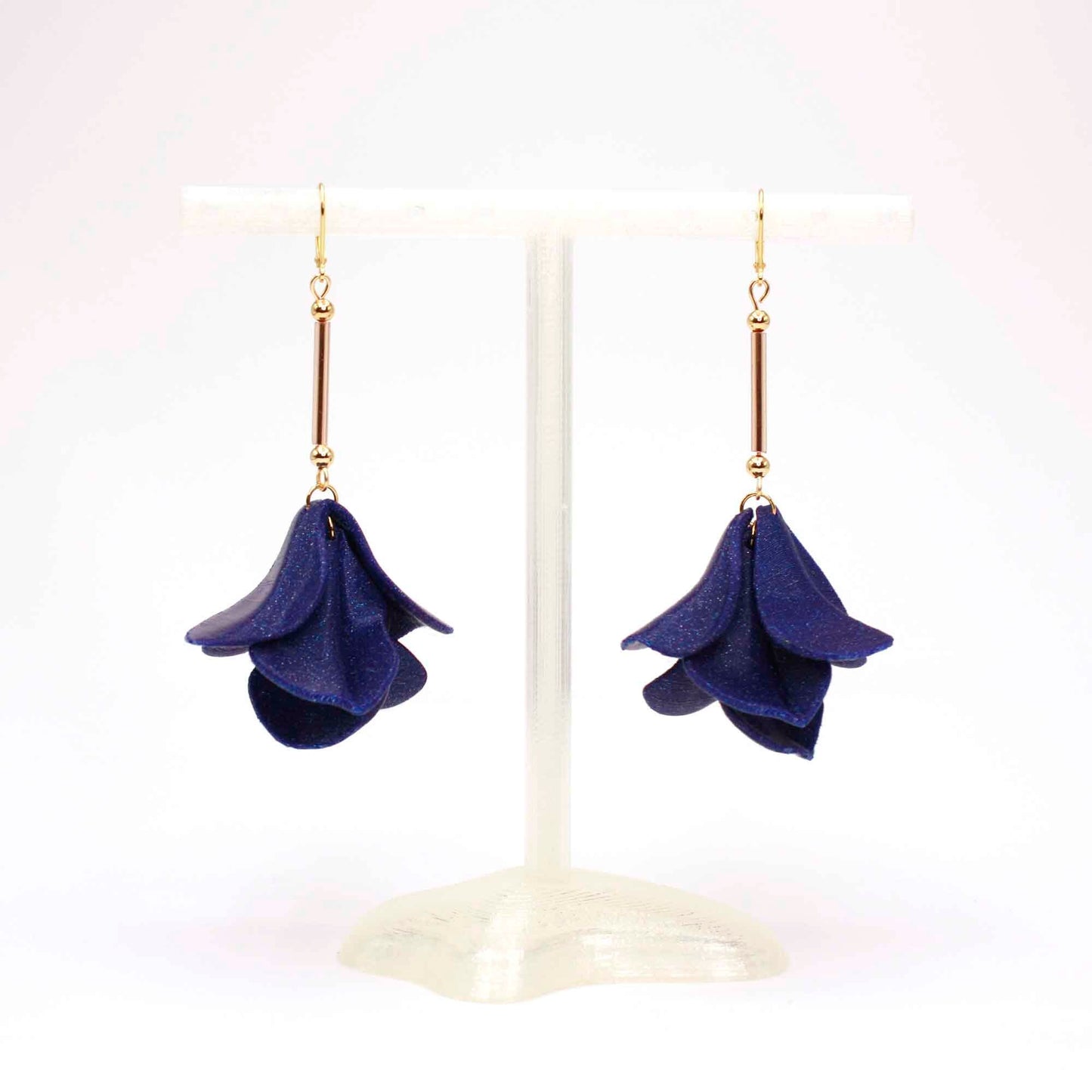 Malvace earrings in Ultramarine Blue. 3D printed in PLA with a glitter effect.