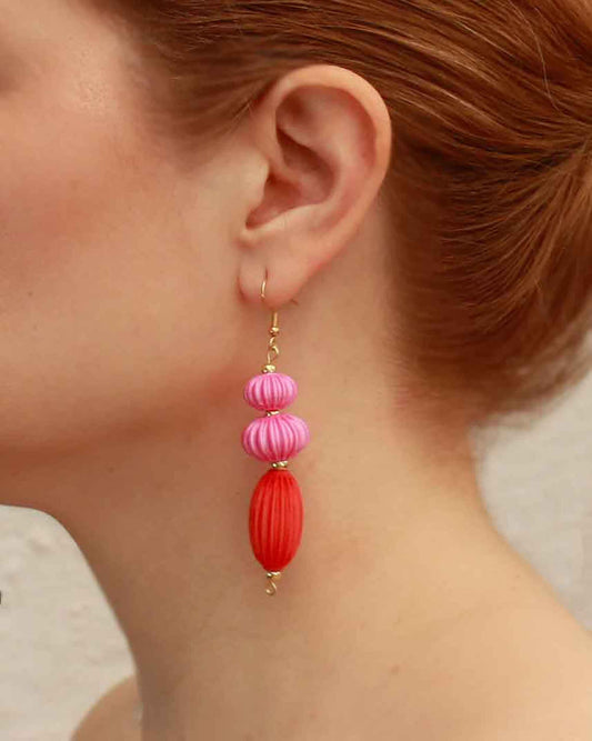 Anemone earrings from the Lukt collection, in vibrant pink and coral red, 3D printed, very light and sophisticated.
