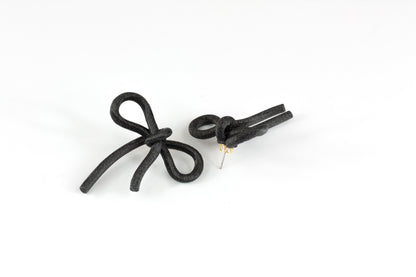 Black bow earrings with snap closure. Coquette Collection.
