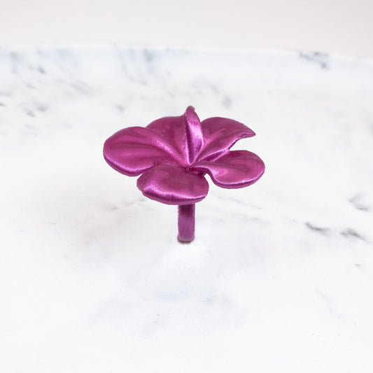 Custom-made 3D printed cyclamen flower-shaped Hibis ring, available in various colors.