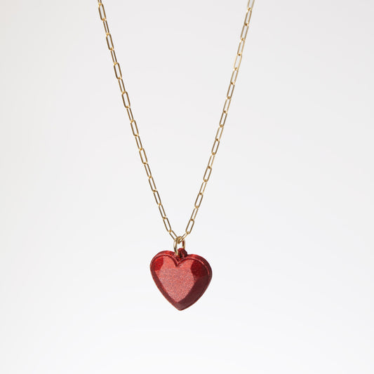 Heart pendant with a red heart shape and a gold-plated silver chain. Inner Love Collection.