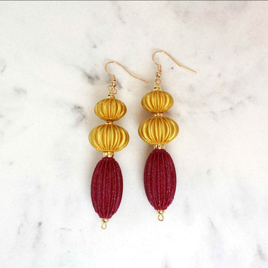 Anemone earrings from the Lukt collection, in Magenta and Gold, 3D printed, very light and sophisticated.