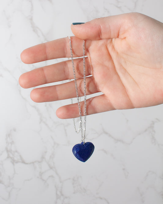 Heart pendant in the shape of a heart, in blue, with a sterling silver chain. Inner Love Collection.