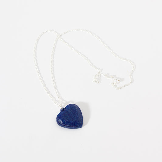Heart pendant in the shape of a heart, in blue, with a sterling silver chain. Inner Love Collection.