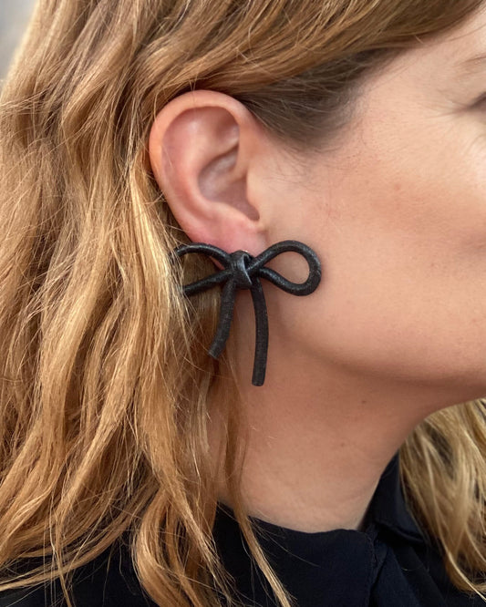 Black bow earrings with snap closure. Coquette Collection.