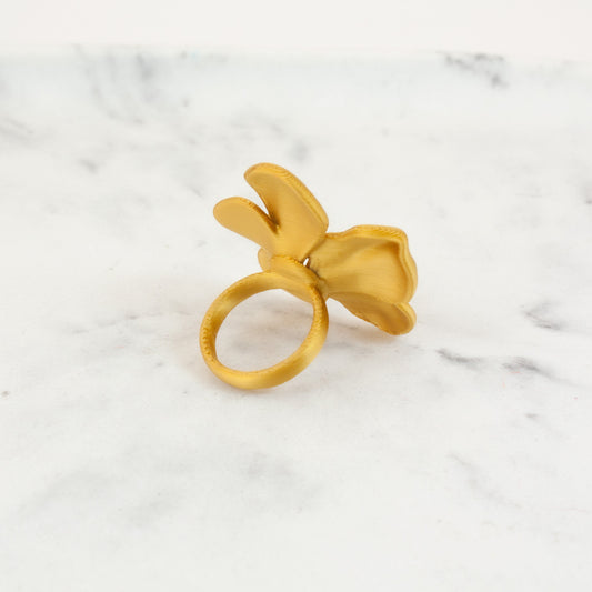Custom-made 3D printed gold flower-shaped Hibis ring, available in various colors.