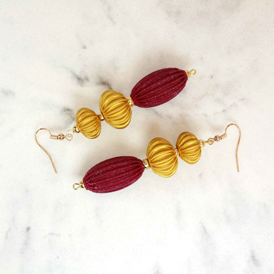 Anemone earrings from the Lukt collection, in Magenta and Gold, 3D printed, very light and sophisticated.