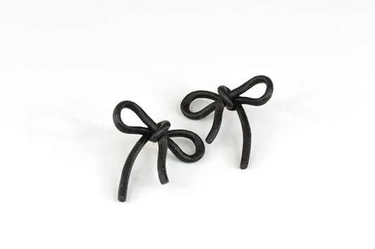 Black bow earrings with snap closure. Coquette Collection.