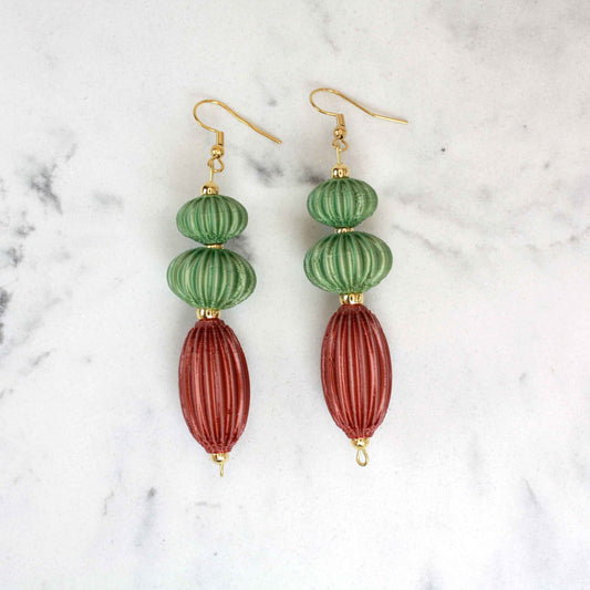 Anemone earrings from the Lukt collection, in Leaf and Cooper Green, 3D printed, very light and sophisticated.